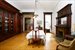Formal dining room with mahogany glass front cabin