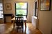 Tree views through dining room