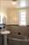 bathroom has tub & separate shower stall
