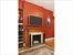 Exposed brick and decorative firepalce