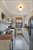 Crisply renovated eat in kitchen