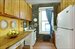 New cabinets and marble countertop with dishwasher