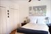 Bedroom with Double Custom Closets