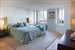 Spacious master bedroom measuring 15 x 13 with views of Rector Park, the Hudson River, and Ellis Island.