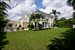 Enjoy the outdoors and fabulous amenities of this 13,479 SF home on an oversized Palm Beach property