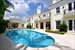 Expansive outdoor loggias add casual or formal entertaining and living spaces