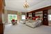 Oversized bedroom with built-in storage and en-suite bath