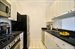 Kitchen with granite counters stainless appliances