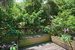 Herb and flower boxes surround the outdoor deck