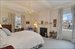 Corner Master Bedroom with Woodburning Fireplace