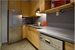 (dining nook and window at other end of kitchen)