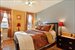 Large master bedroom with recessed lighting