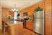 Renovated kitchen with Corian counters and DW