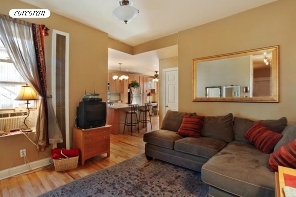 Cozy living room looking into kitchen