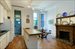 Bright open eat-in  kitchen with fireplace
