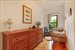 Charming second bedroom with wainscoting