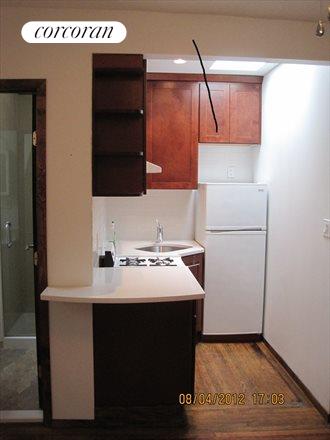 There is a skylight in the kitchen