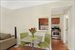 Dining area next to kitchen with pass-thru window