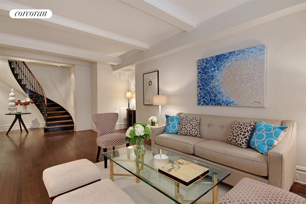 Living Room with Dramatic Staircase