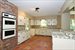 Eat-in Kitchen with original brick detail 