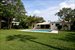 Large, tropical backyard with beautiful new pool