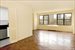 spacious living room  w/oak floors and central air