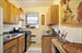 Galley kitchen w room for cafe style seating