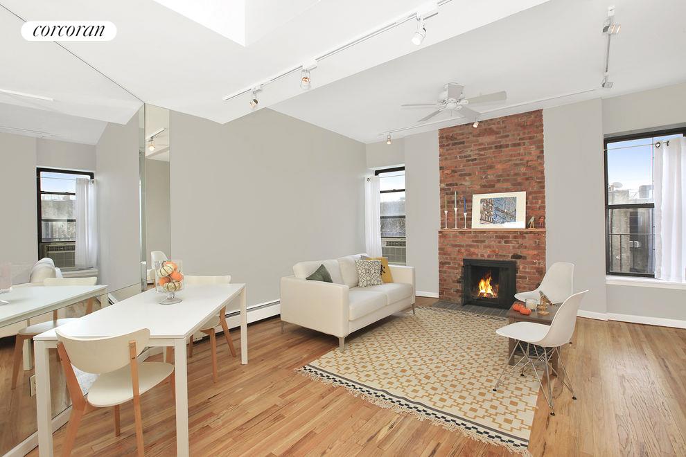 South facing living room with skylight and WBFP