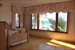 Large windows open onto ocean views
