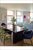 Enjoy picturesque sunsets from your spacious living room or from one of two private balconies each with views of Rector Park, the Hudson River, and Ellis Island.