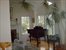 living room with piano