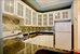 Granite counters, ample frosted glass storage.