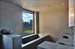 Master bath with park views from large soaking tub