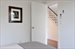 View out of lower bedroom suite to stairs leading up to living space and master suite