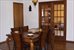 dining room with french doors to sunroom