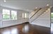 Living room with view of staircase