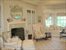 Master bedroom by fireplace