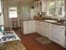 kitchen with door to garden and brick patio