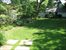 beautiful yard and garage