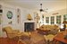 Great room wih fireplace and french doors to the outside