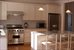 chef's kitchen with adjacent dining room