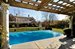 Pergula covered dining area and pool
