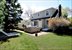Rear of house, deck, hot tub and outdoor shower