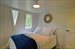 Downstairs bedroom with full bath