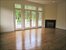Downstairs Master with fireplace and french doors leading out