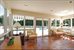 Family room overlooking pool with fireplace