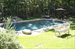 Heated gunite pool with waterfall