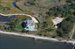 Drive through the privacy gates, over 3 connecting bridges to your private island retreat