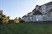 Side yard and home elevation