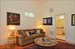 Den with fireplace also has full bath
